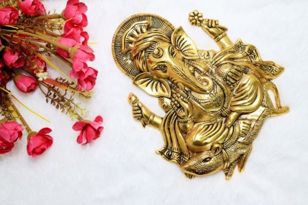 Kamalasana Ganesha Wall Hanging ( 4 more): Finely engraved wall hanging of lord ganesha which will look fantastic on your wall